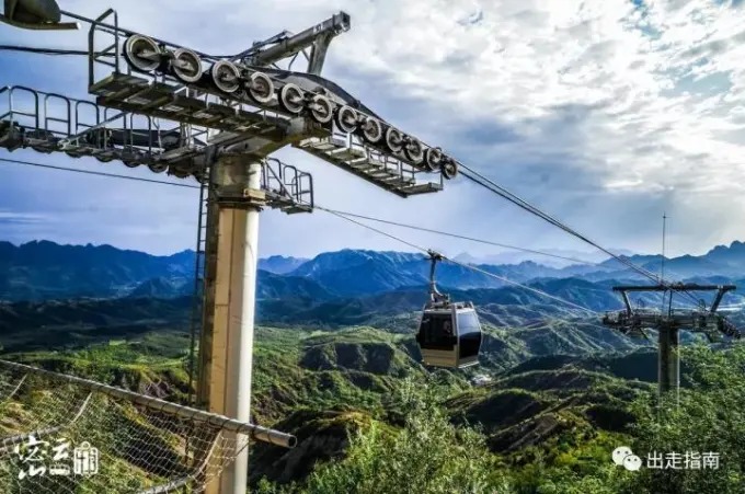 Cableway cabins above the mountain valleys
